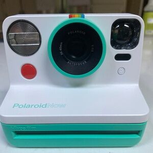 Teal Polaroid camera no film